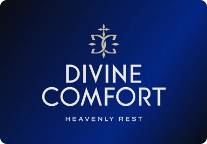 Divine Comfort logo: An ornamental emblem in champagne over a rounded sans-serif wordmark.