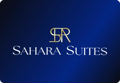 Sahara Suites logo: A gold serif monogram above a small-capitals serif wordmark.